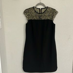Ted Baker, London black dress with gold and black lace detailed top